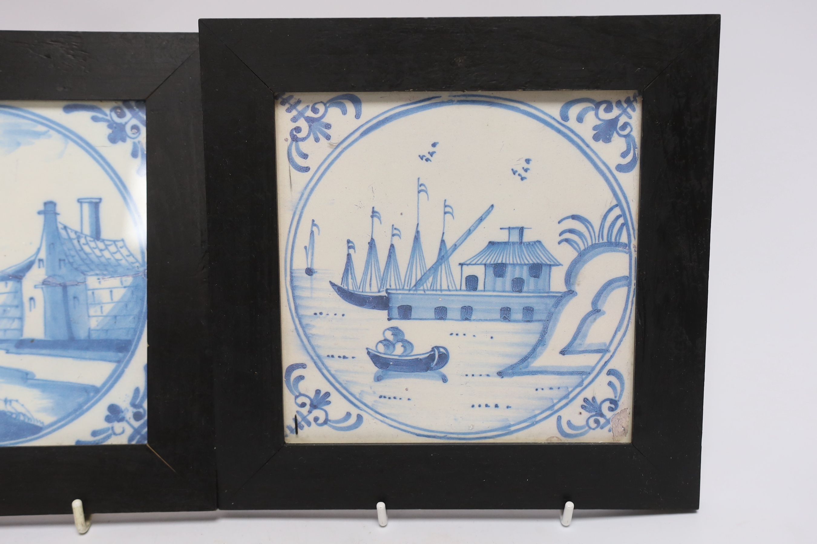 Two framed prints of 18th century Delft blue and white tiles